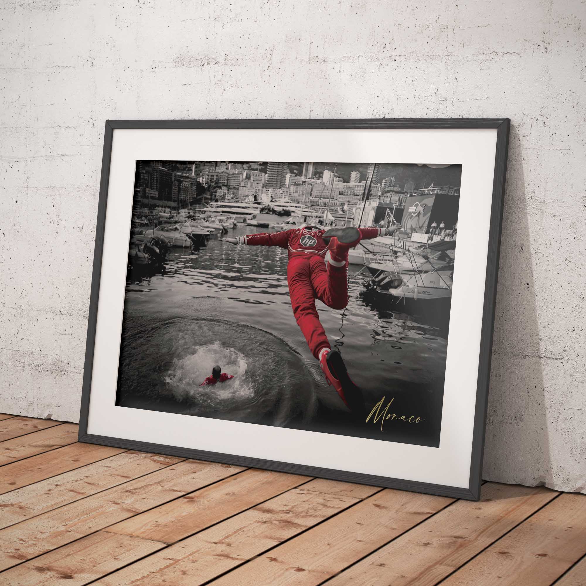 Photograph of a Charles Leclerc performing a dive into water in Monaco harbour.