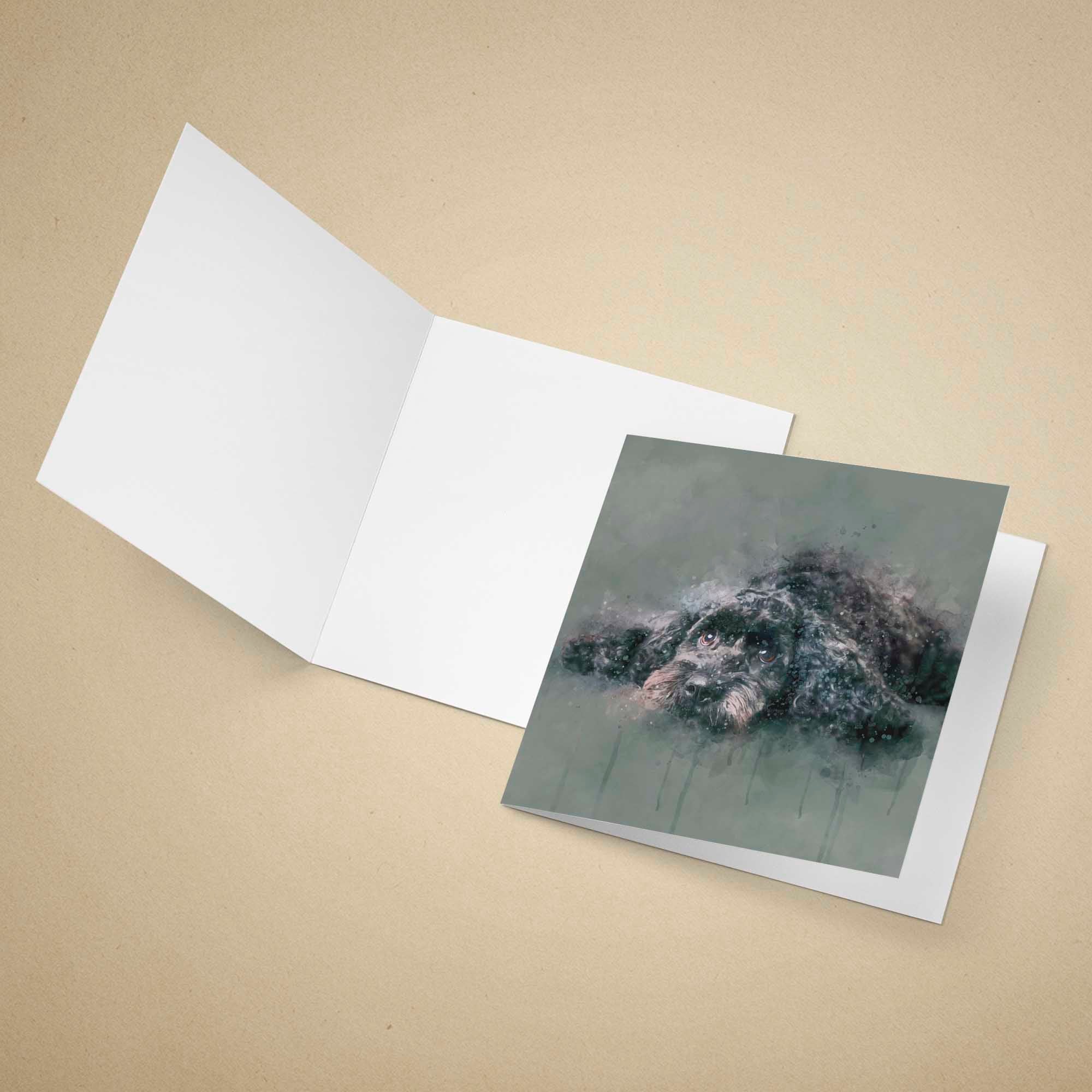 Open greeting card with a cockapoo dog painting on a beige background