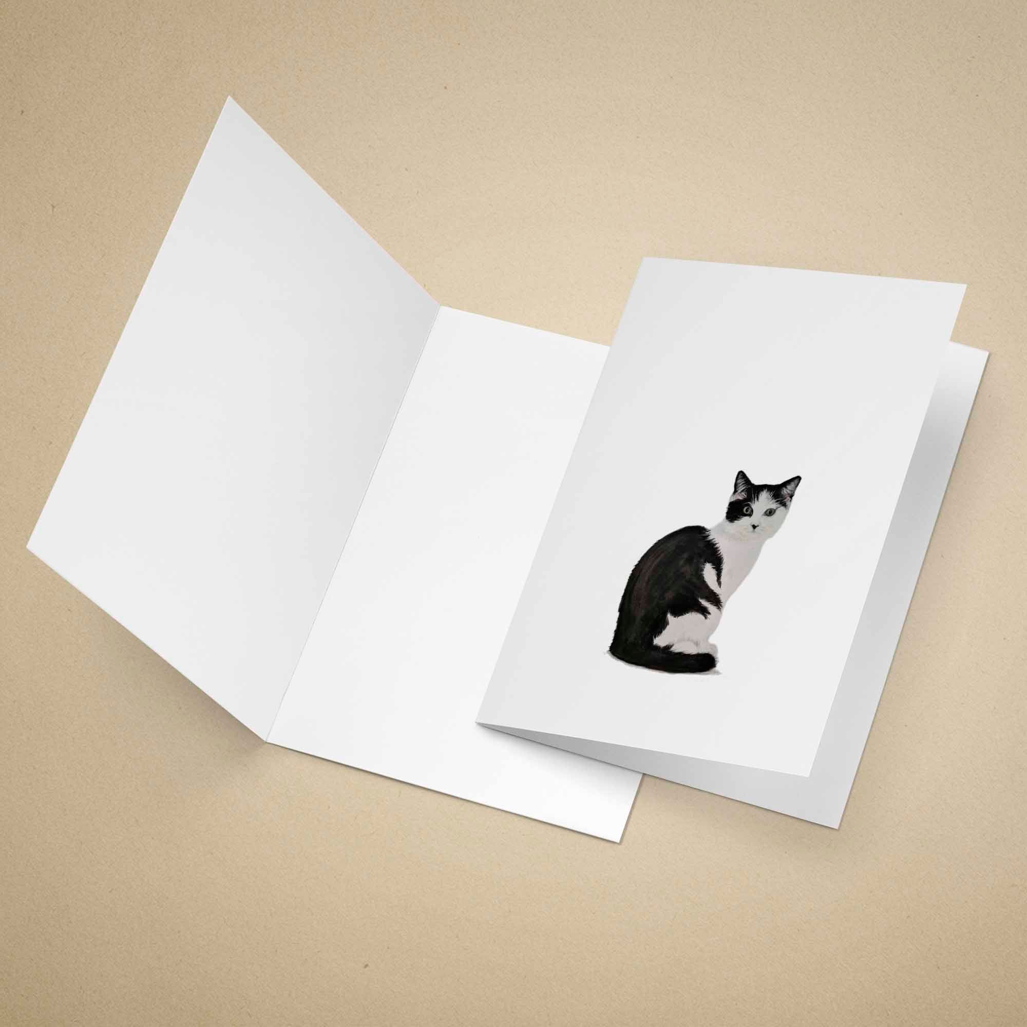 White greeting card with a black and white cat illustration on a beige background