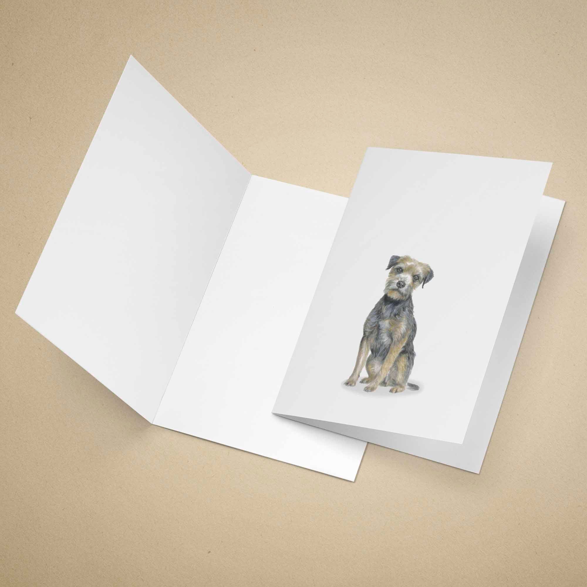Greeting card with a Border Terrier on a beige background