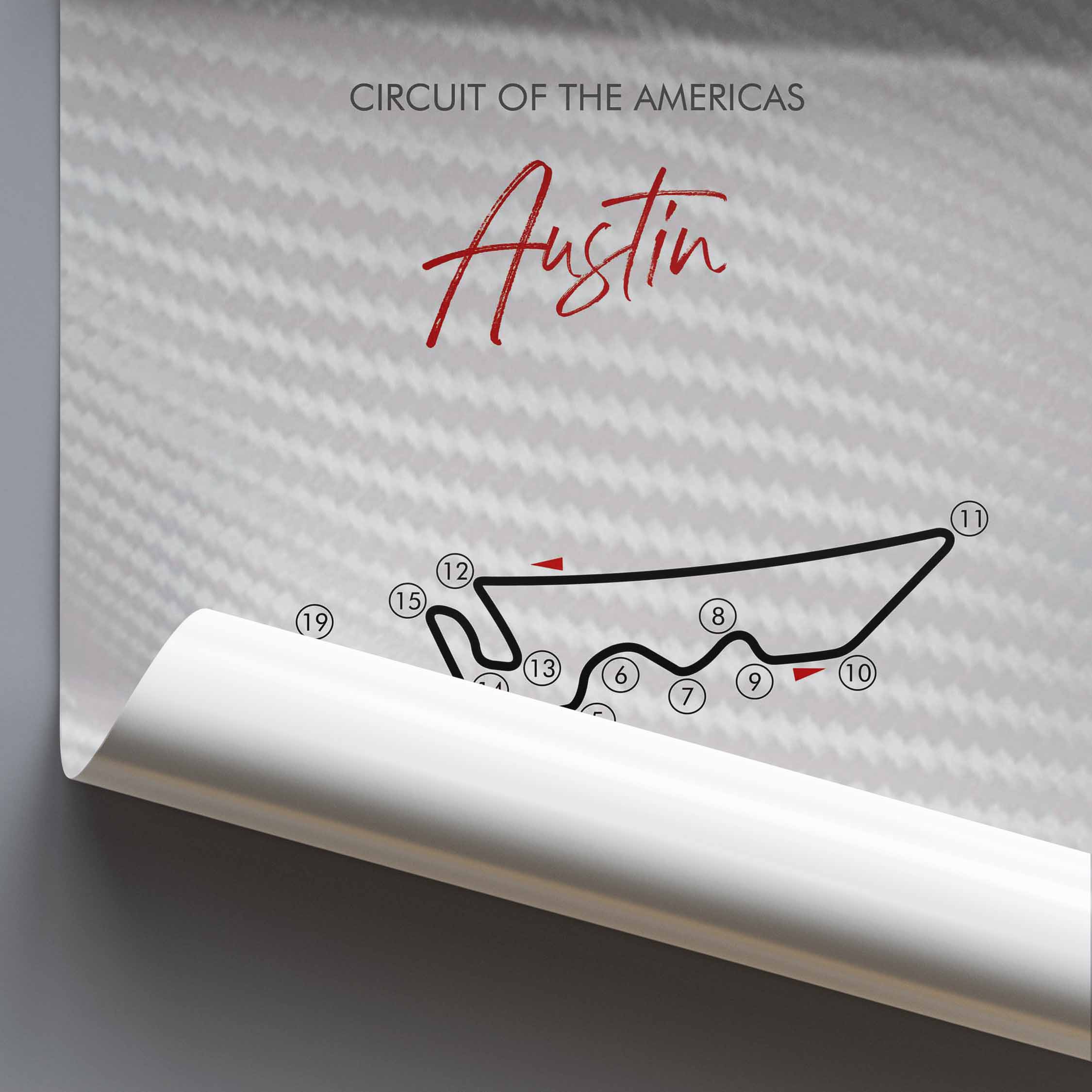 Rolled poster of the Circuit of the Americas race track design on a grey background.