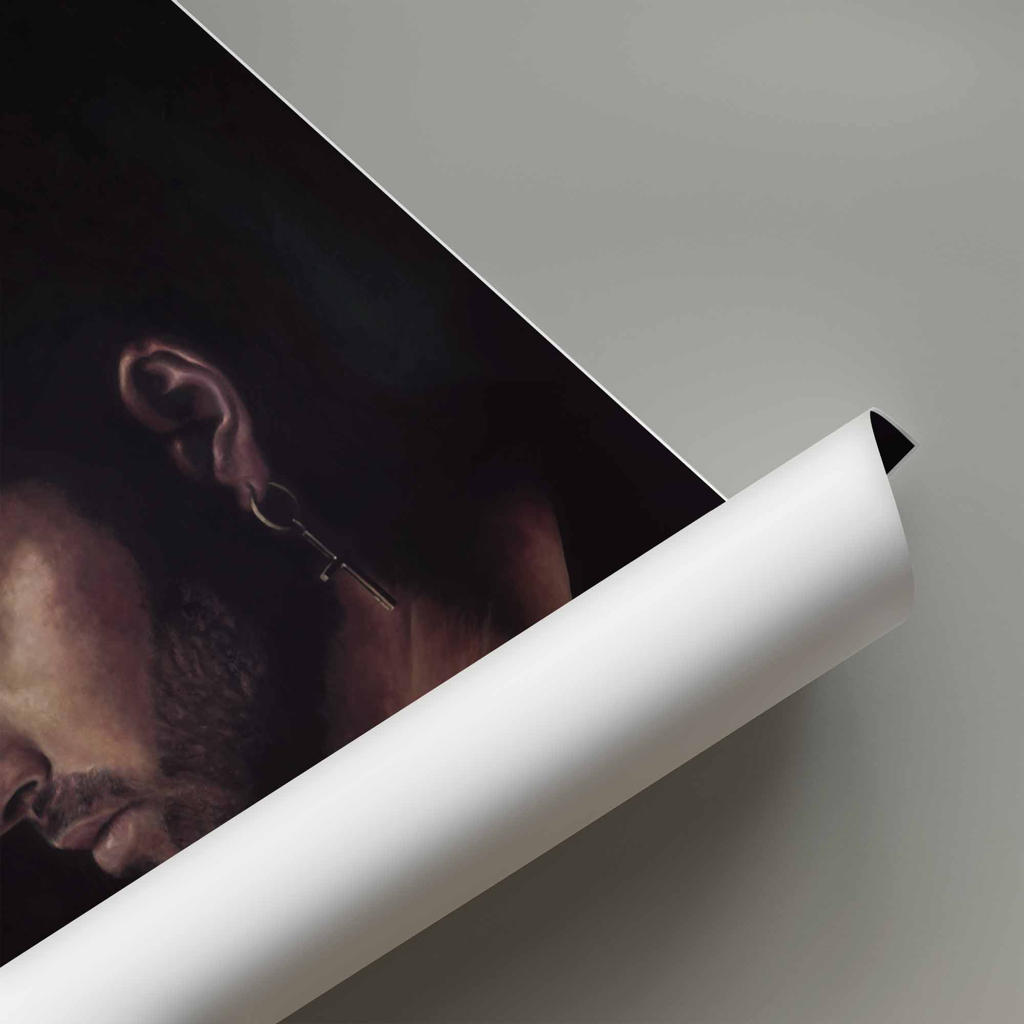 Roll of white paper with a portrait of George Michael on a gray background