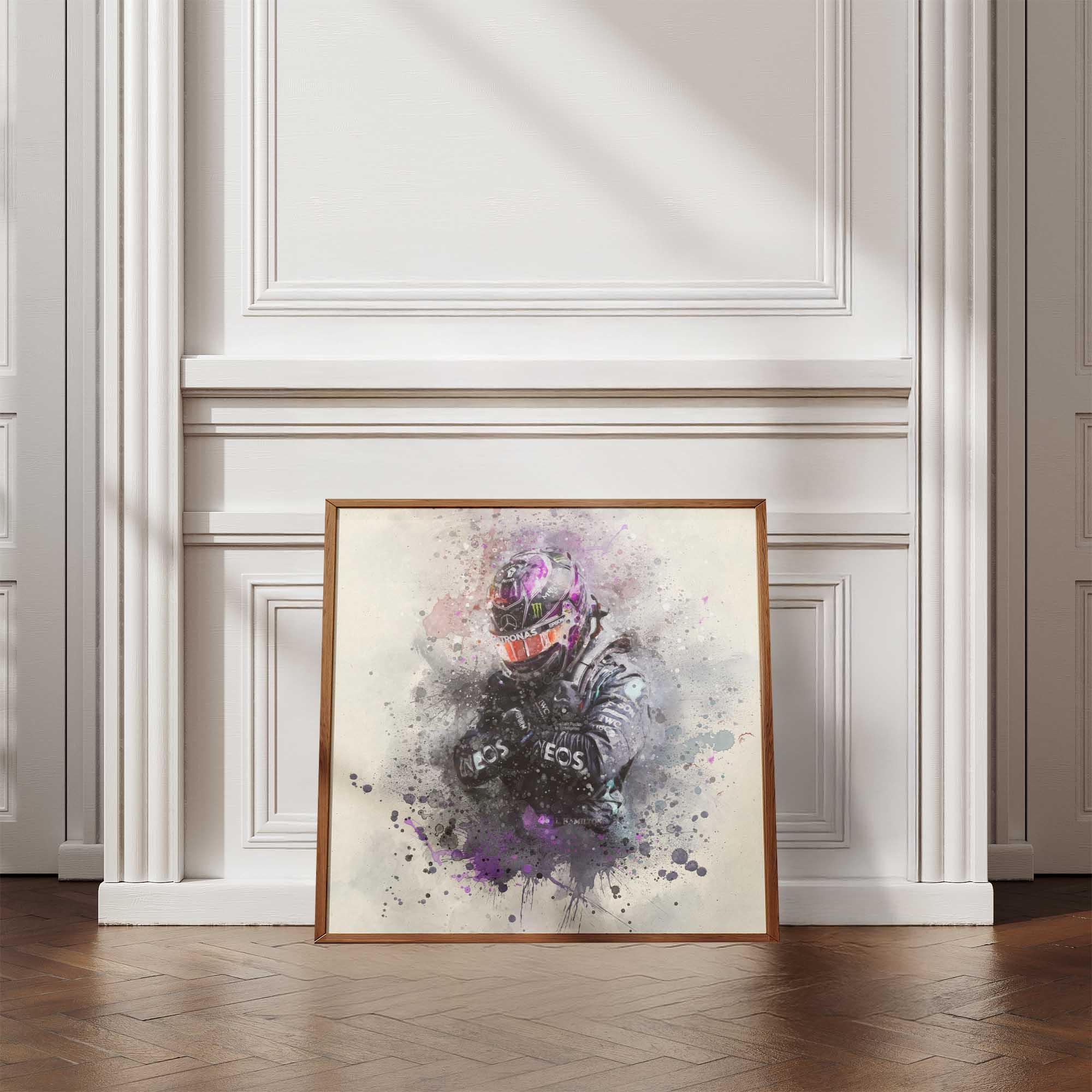 Framed artwork of a racing driver in a helmet on a wall with decorative molding.