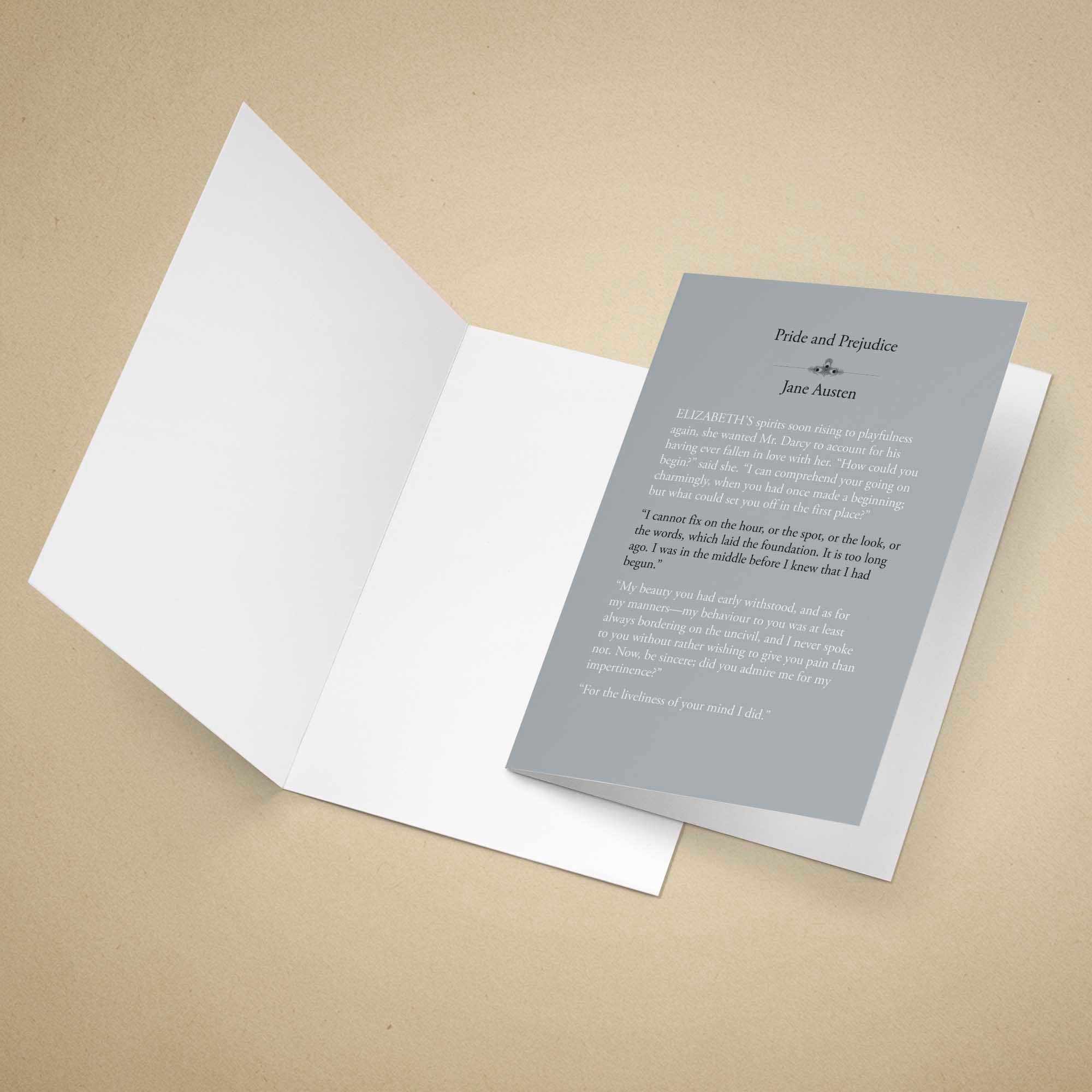 Open card with a gray interior page featuring text on a beige background