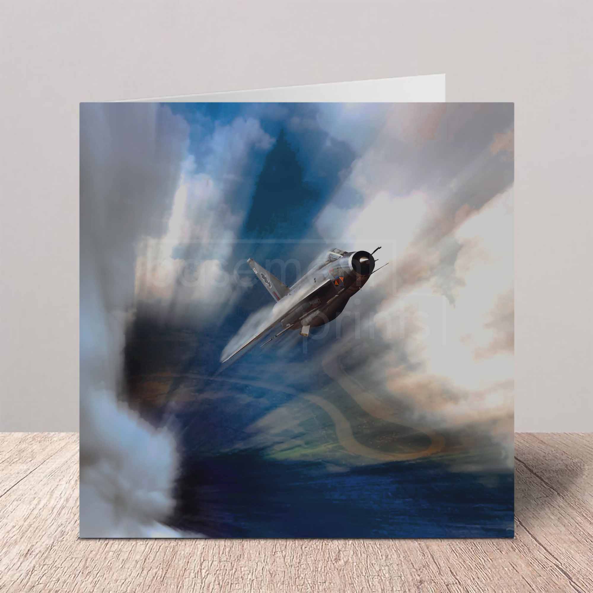 Greeting card with a vintage airplane flying through clouds on a wooden surface.