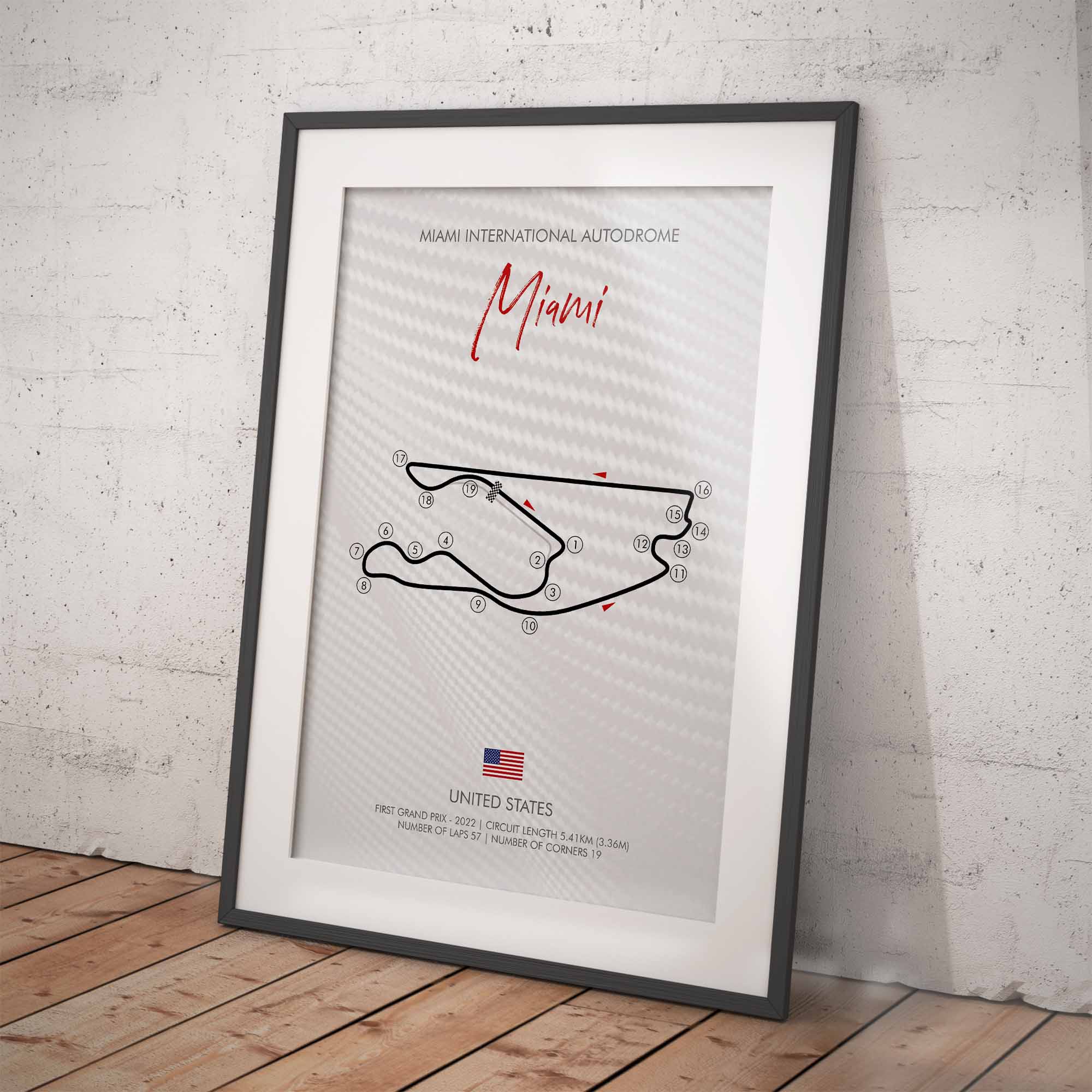 Framed poster of Miami International Autodrome track layout on a white wall background