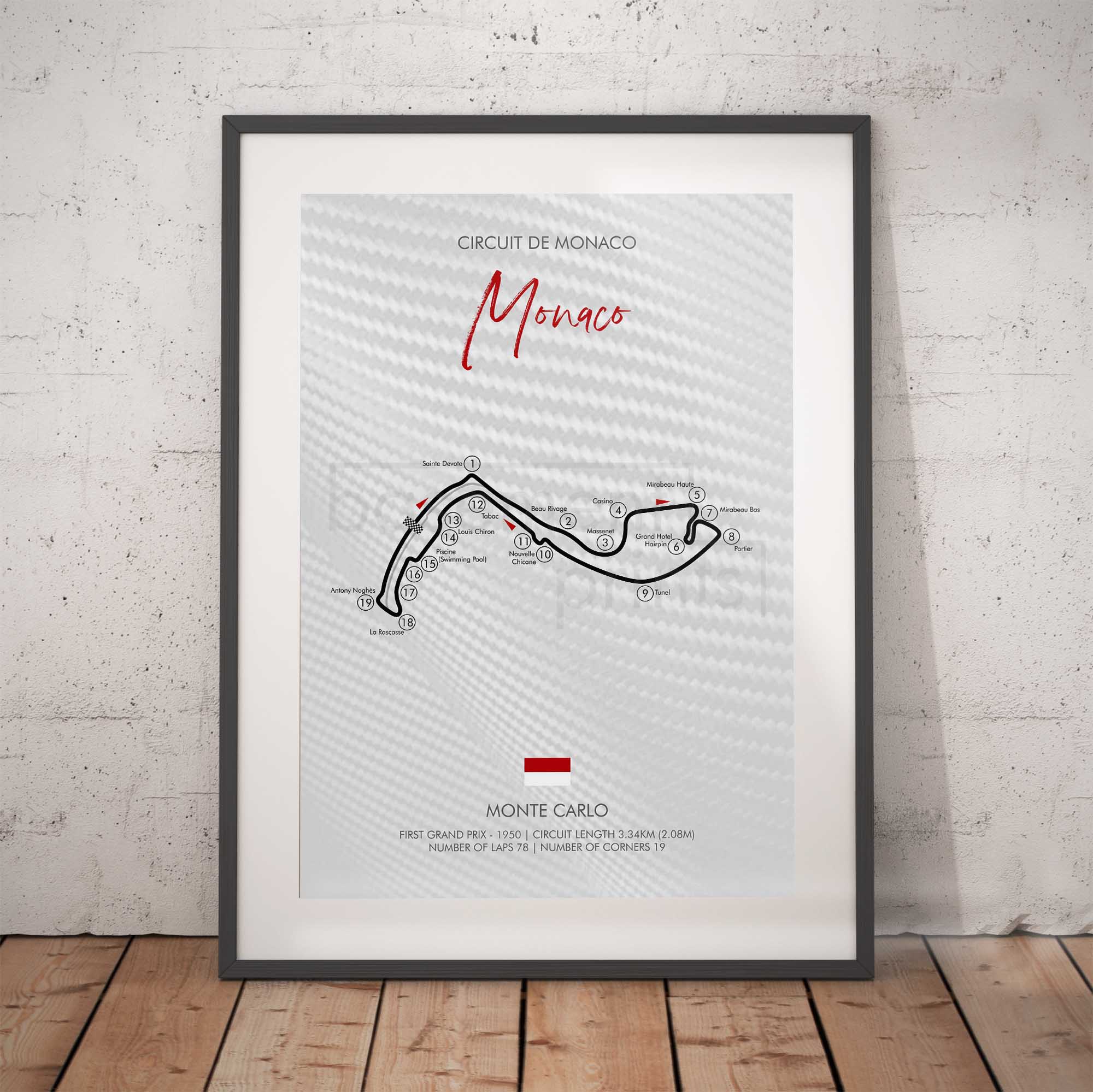 Framed poster of the Circuit de Monaco race track design on a white wall.