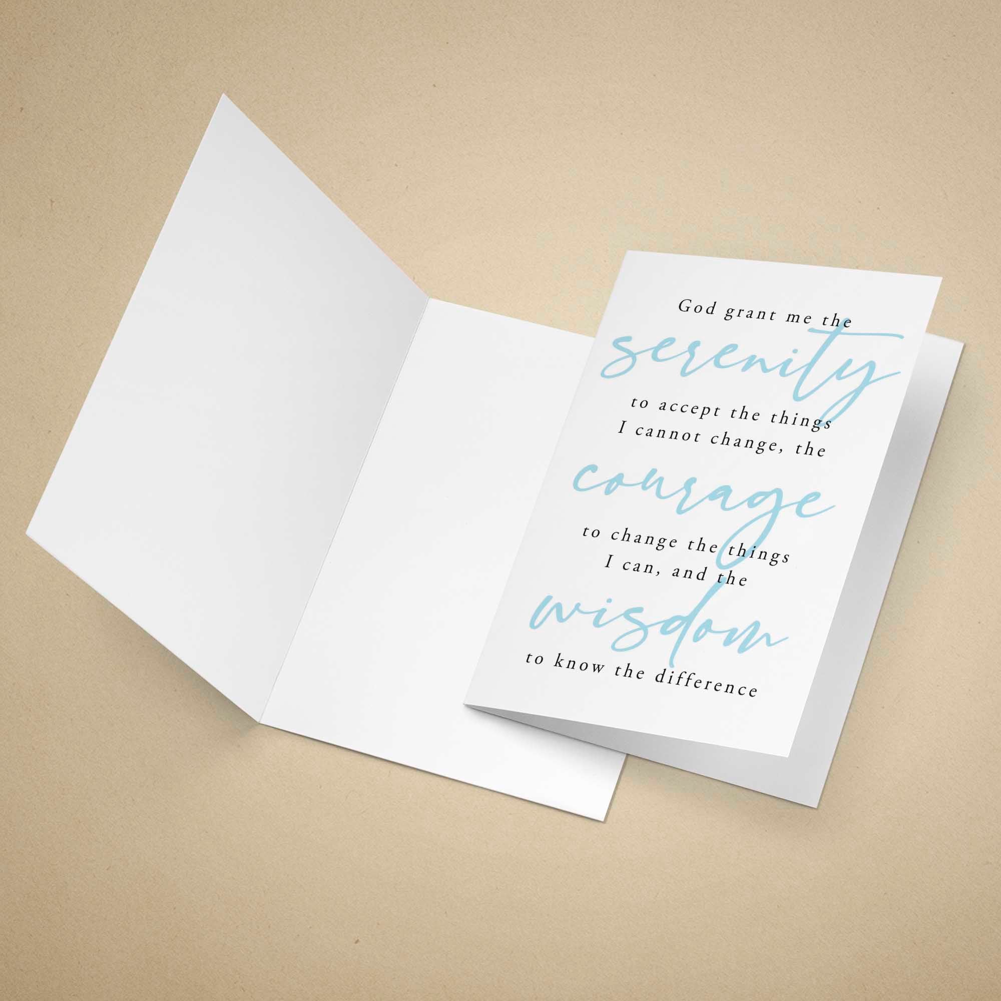 Open card with inspirational text on a beige background