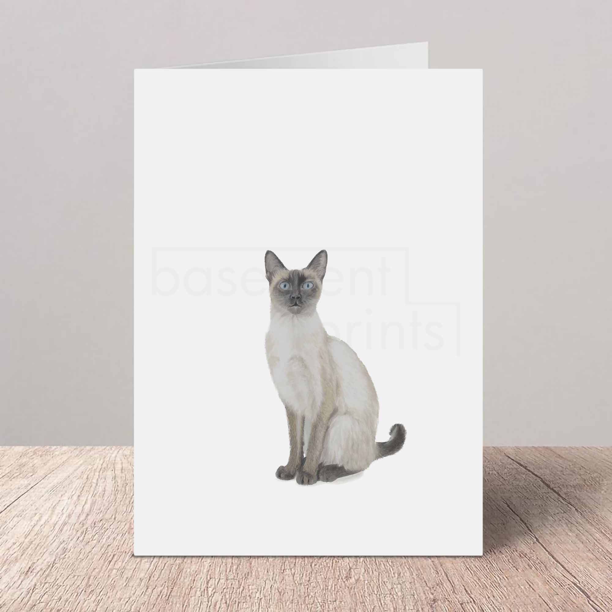 Greeting card with a Siamese cat on a white background