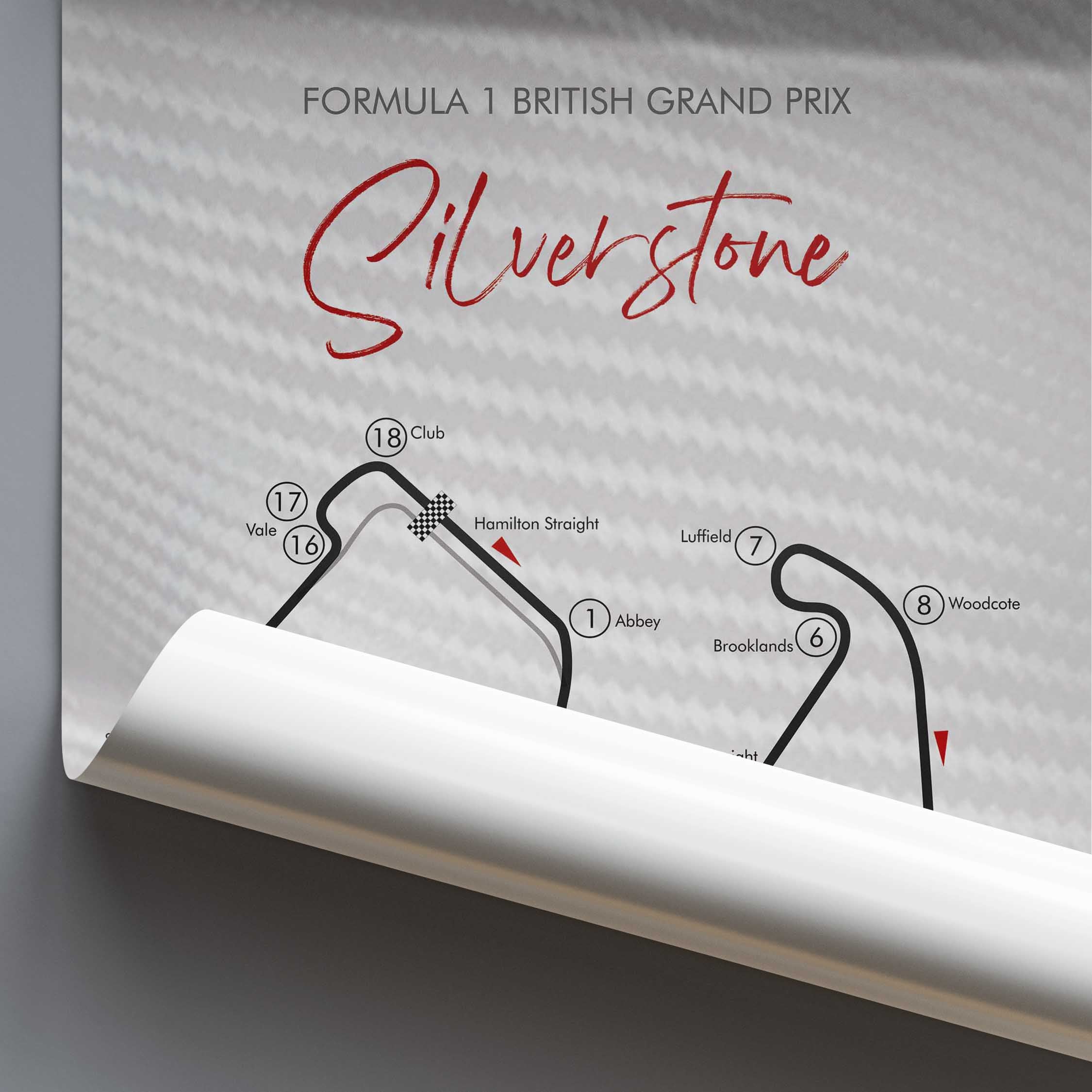 Formula 1 British Grand Prix Silverstone track layout on a textured gray background