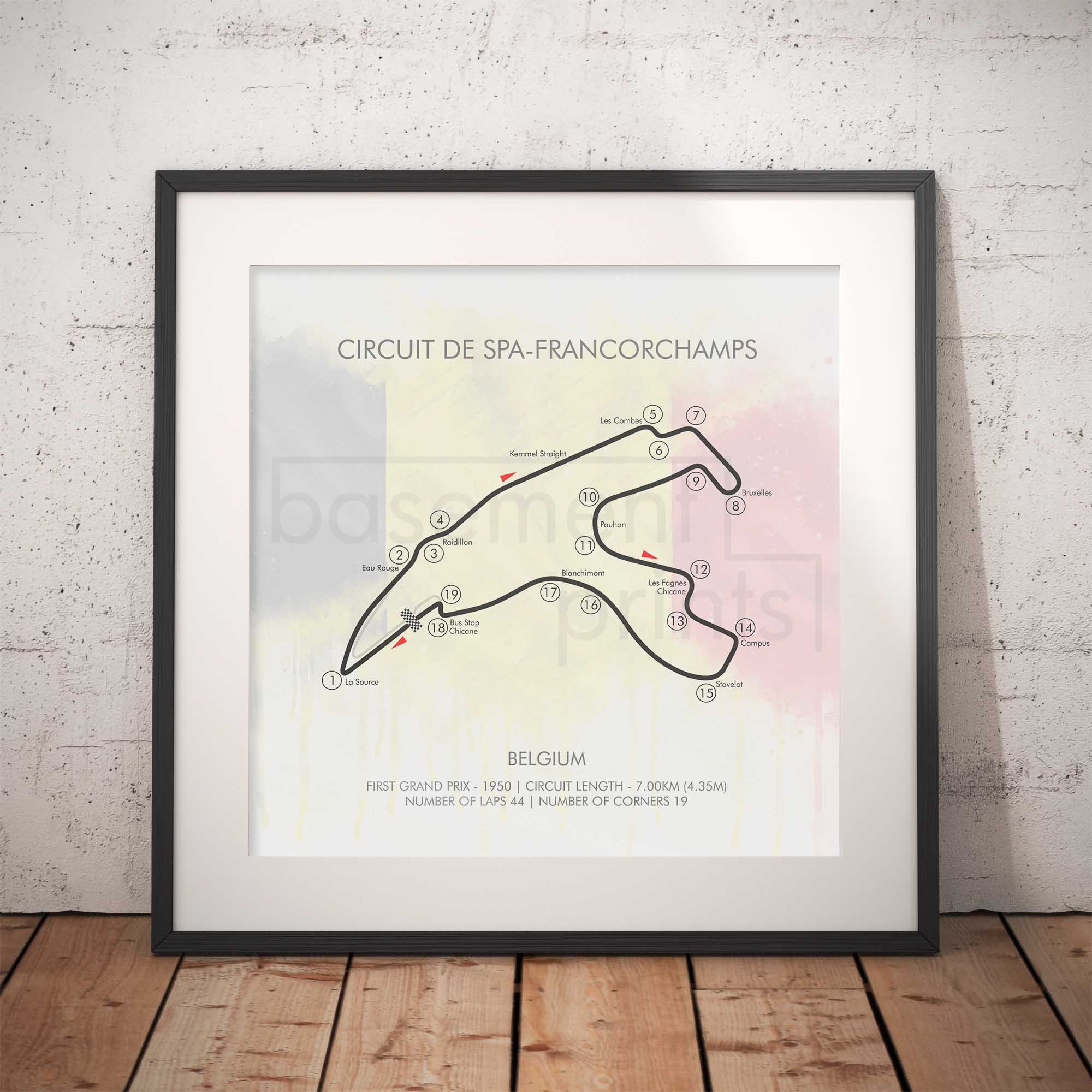 Framed poster of Circuit de Spa-Francorchamps layout on a brick wall background