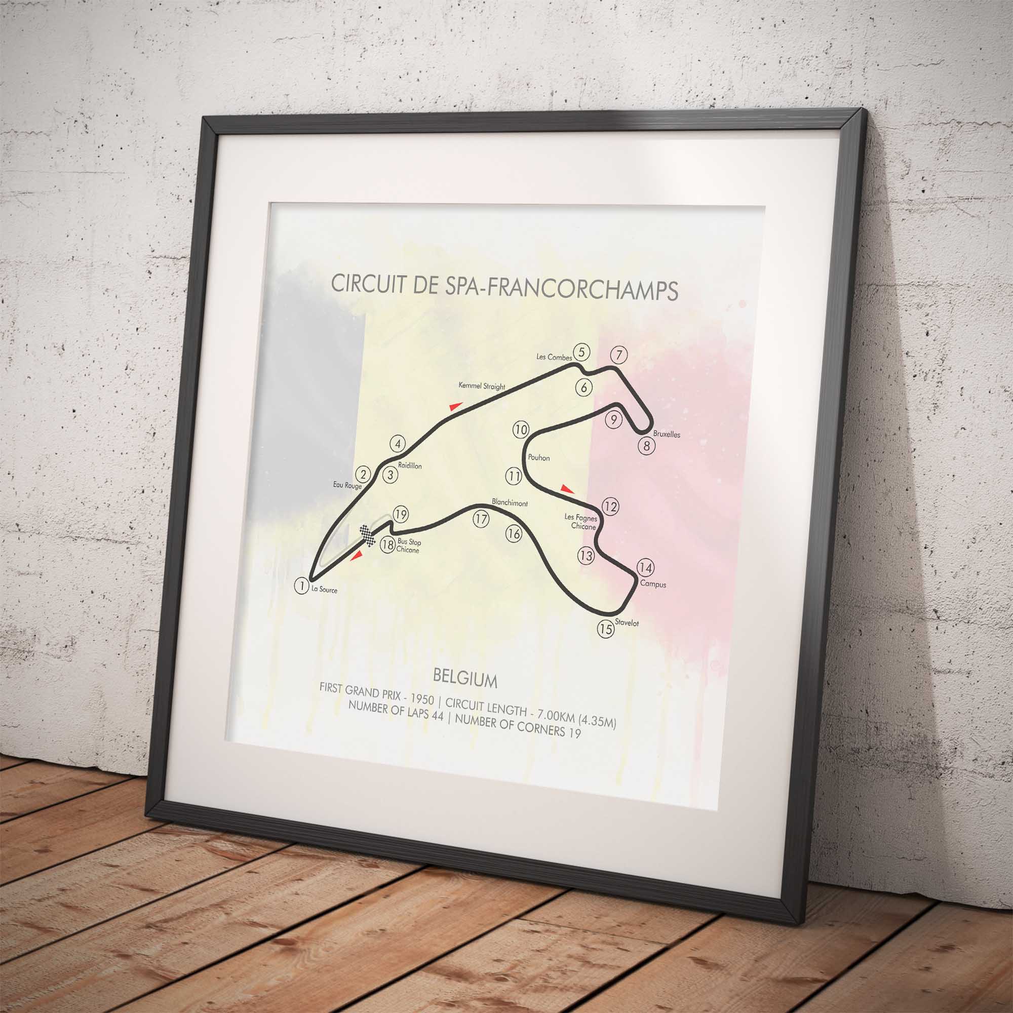 Framed map of Circuit de Spa-Francorchamps on a white wall.