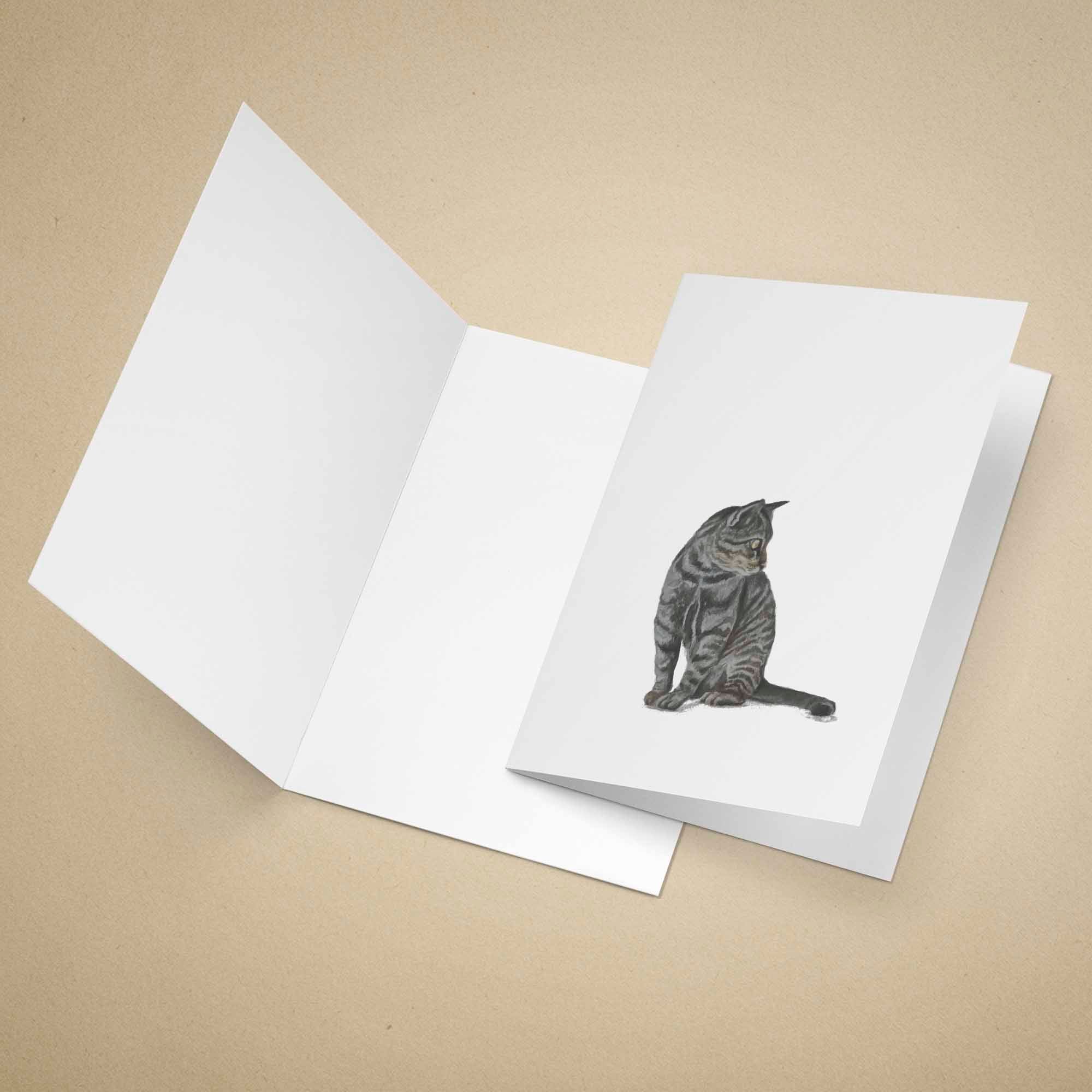 Greeting card with a grey tabby cat design on a beige background