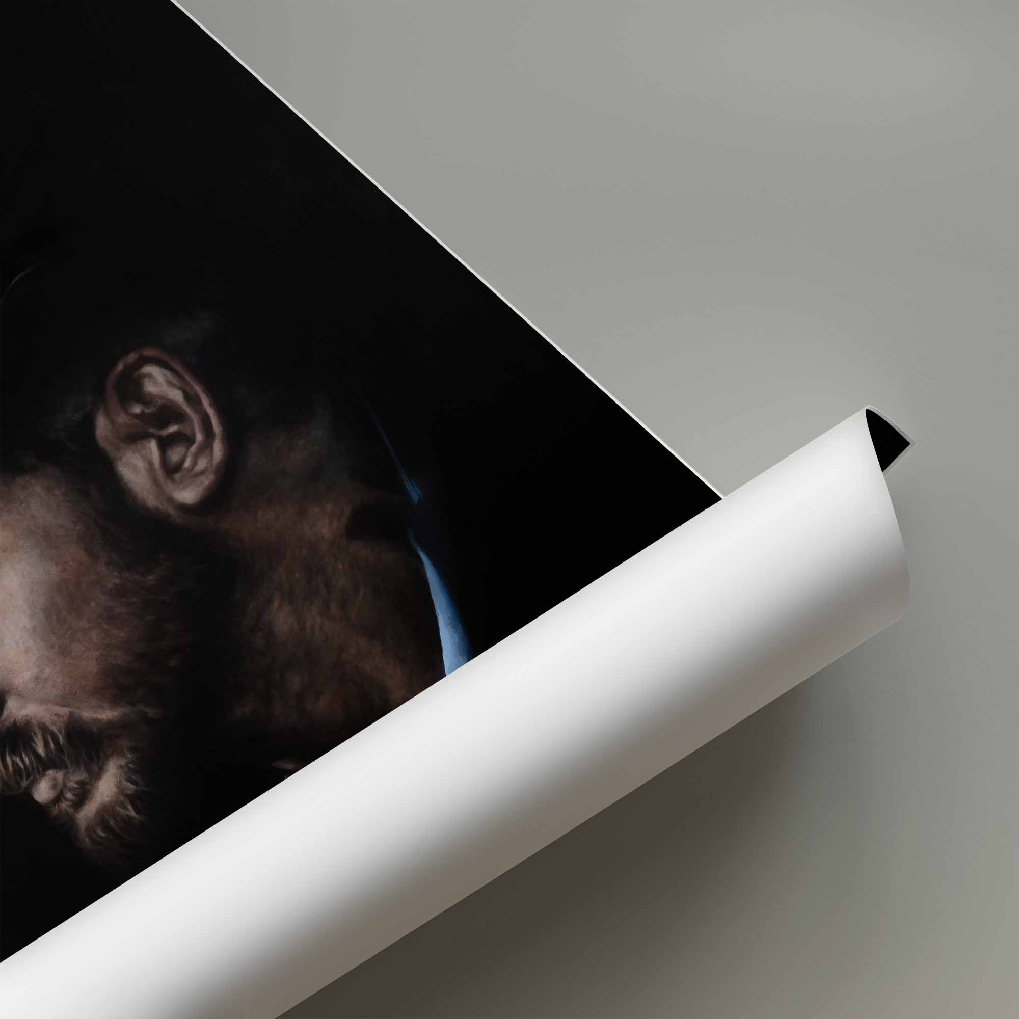 Close-up of a poster roll of Tom Hardy with a dark background