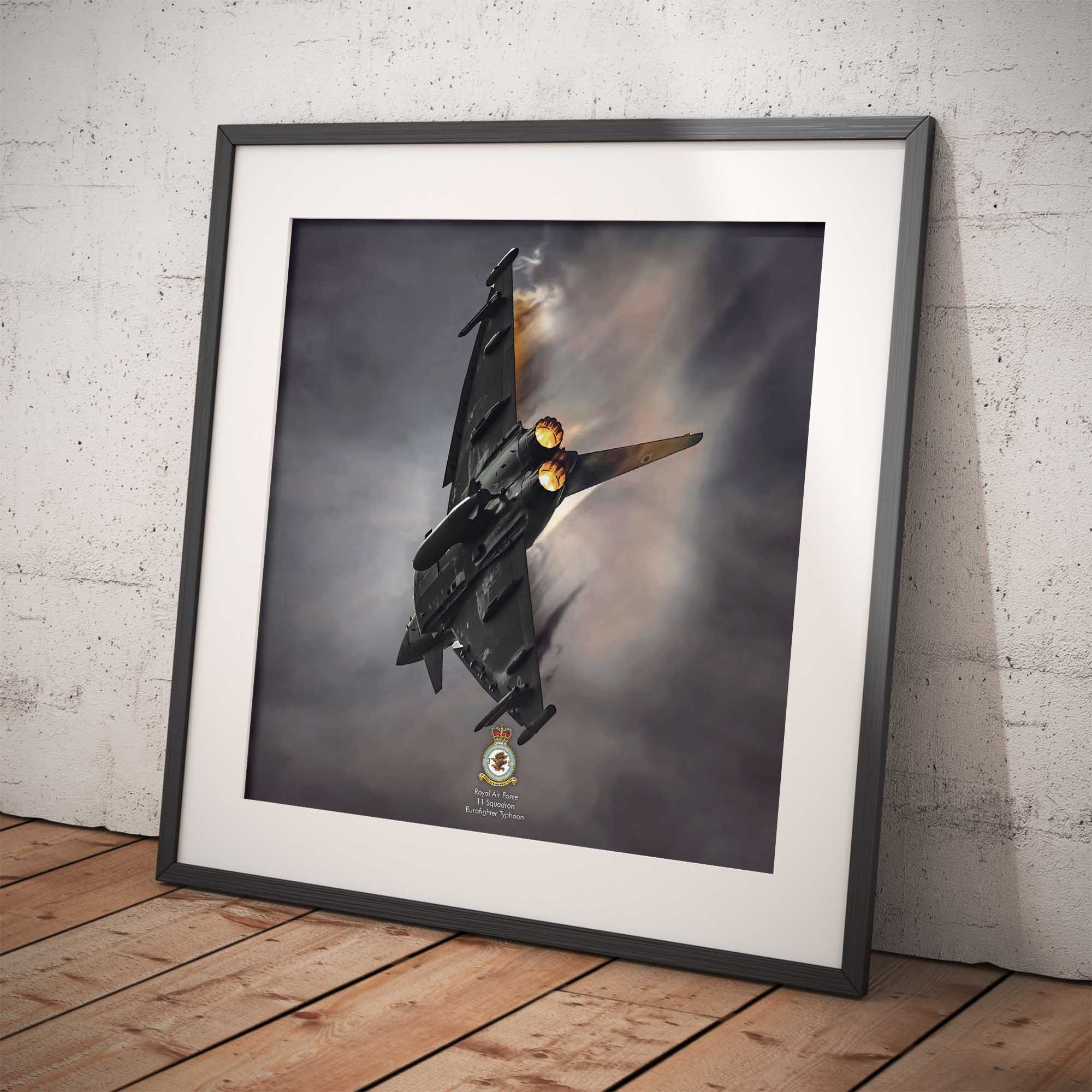 Artwork of a Eurofighter fighter jet against a cloudy sky on a wooden floor with a concrete wall background.