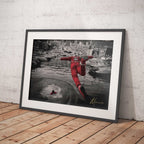 Photograph of a Charles Leclerc performing a dive into water in Monaco harbour.