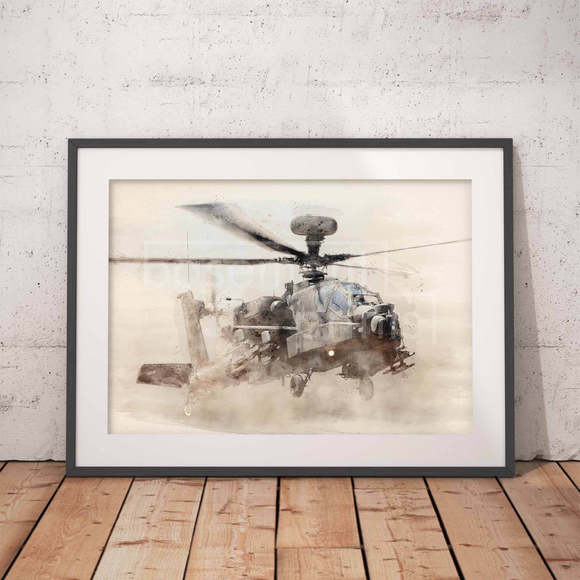 Framed artwork of an Apache helicopter on a wooden floor with a white brick wall background