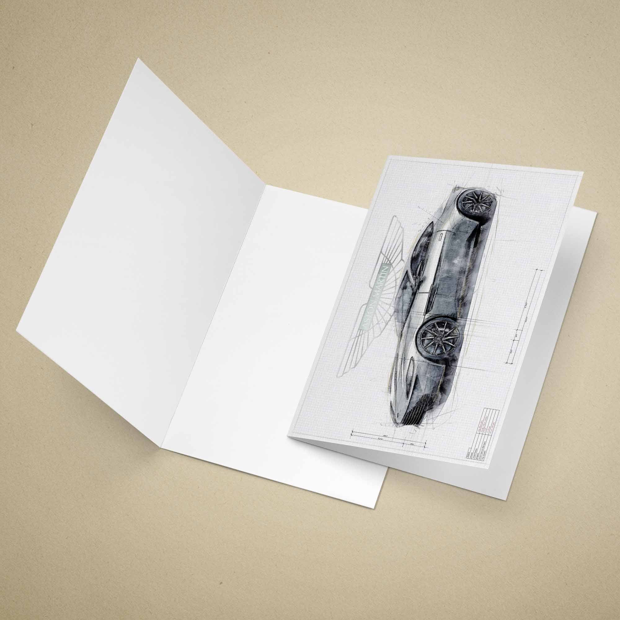 Open greeting card with James Bonds Aston Martin DB10 car on a beige background
