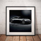Framed artwork of an Aston Martin DB10 car on a dark background with '007' branding, displayed against a textured wall.
