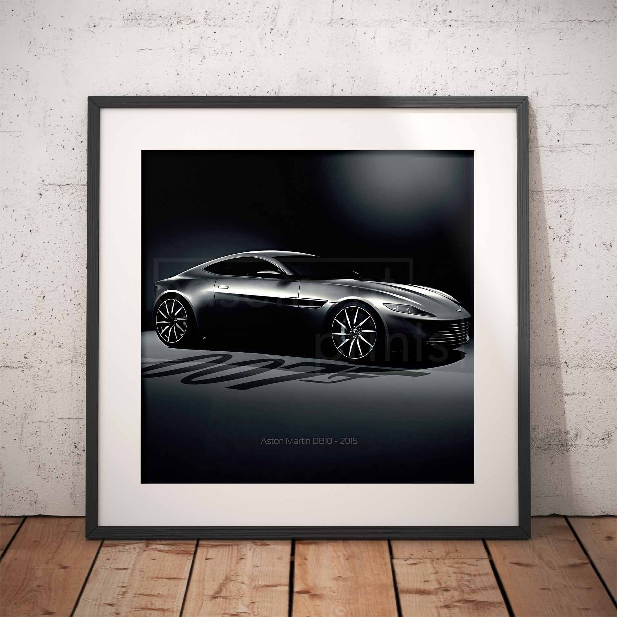 Framed artwork of an Aston Martin DB10 car on a dark background with '007' branding, displayed against a textured wall.