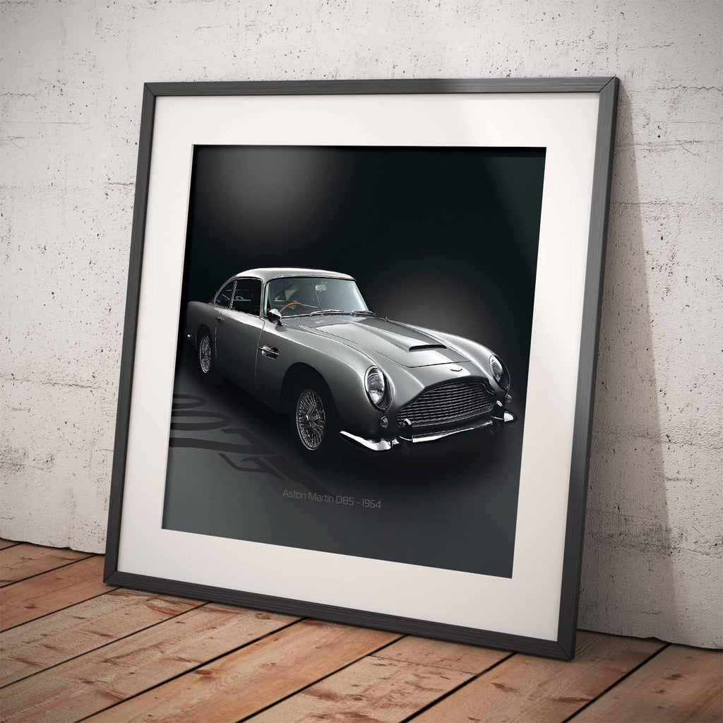 Framed poster of James Bonds Aston Martin DB5 car on a textured wall.