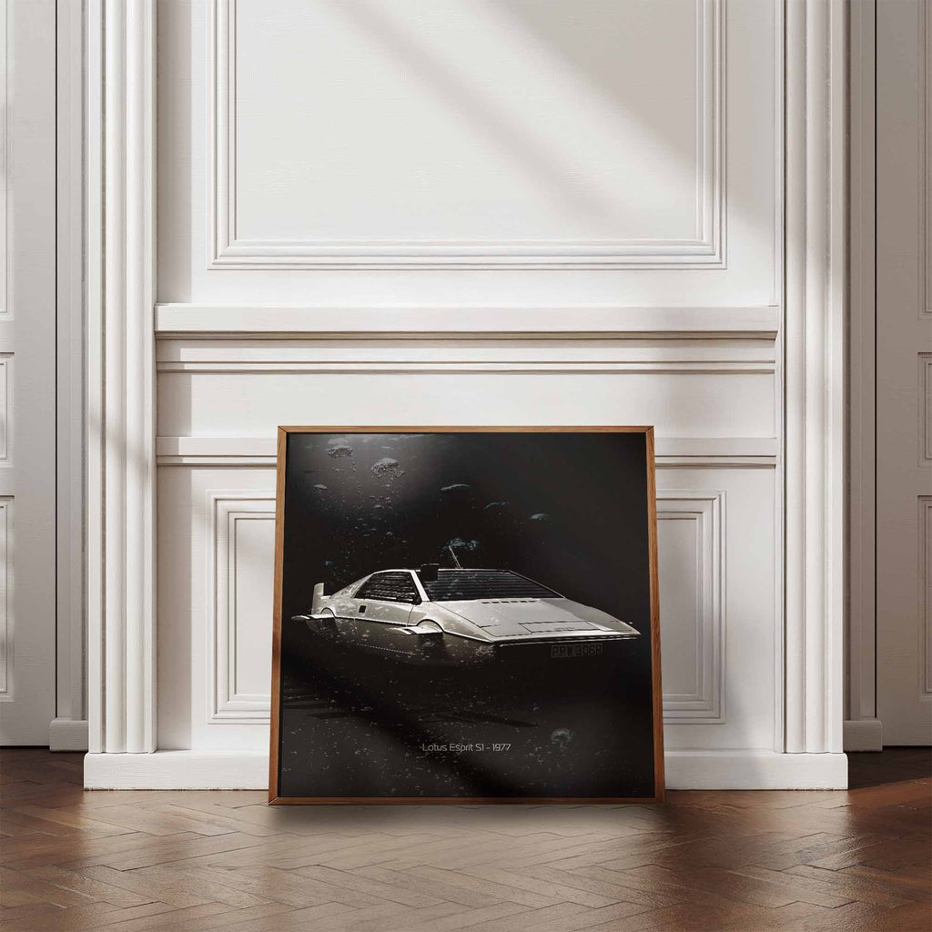 Framede artwork of James Bonds Lotus Esprit S1 car on a wall with wooden floor and white walls.