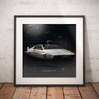 Framed artwork of James Bonds Lotus Esprit S1 car underwater scene on a textured wall.