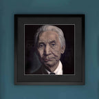 Framed portrait of Charlie Watts on a blue wall