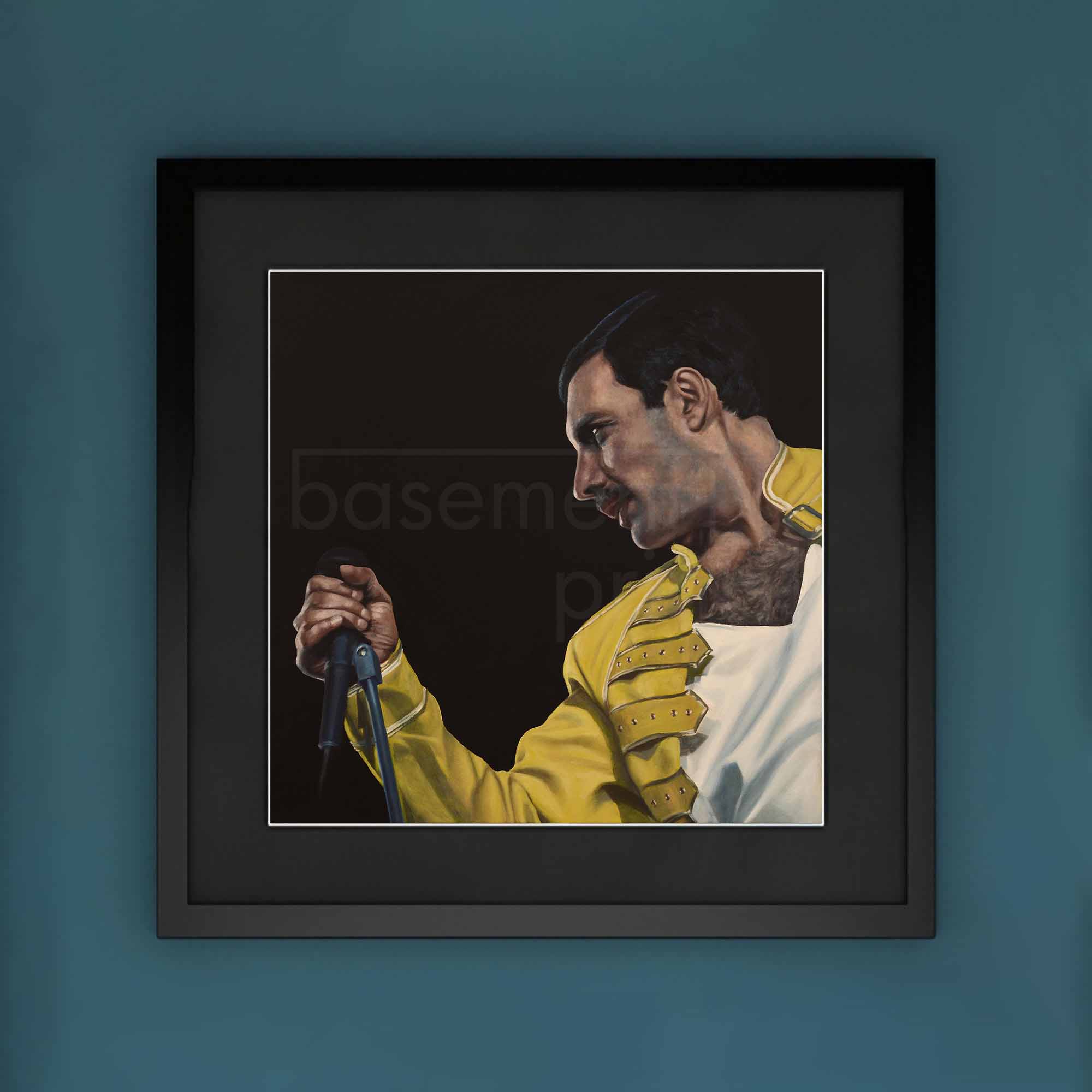Framed artwork of Freddie Mercury in a yellow jacket on a blue wall