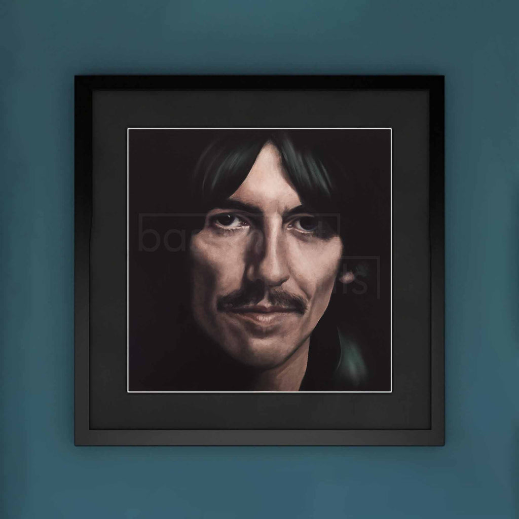 Framed portrait of George Harrison on a blue wall