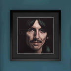 Framed portrait of George Harrison on a blue wall