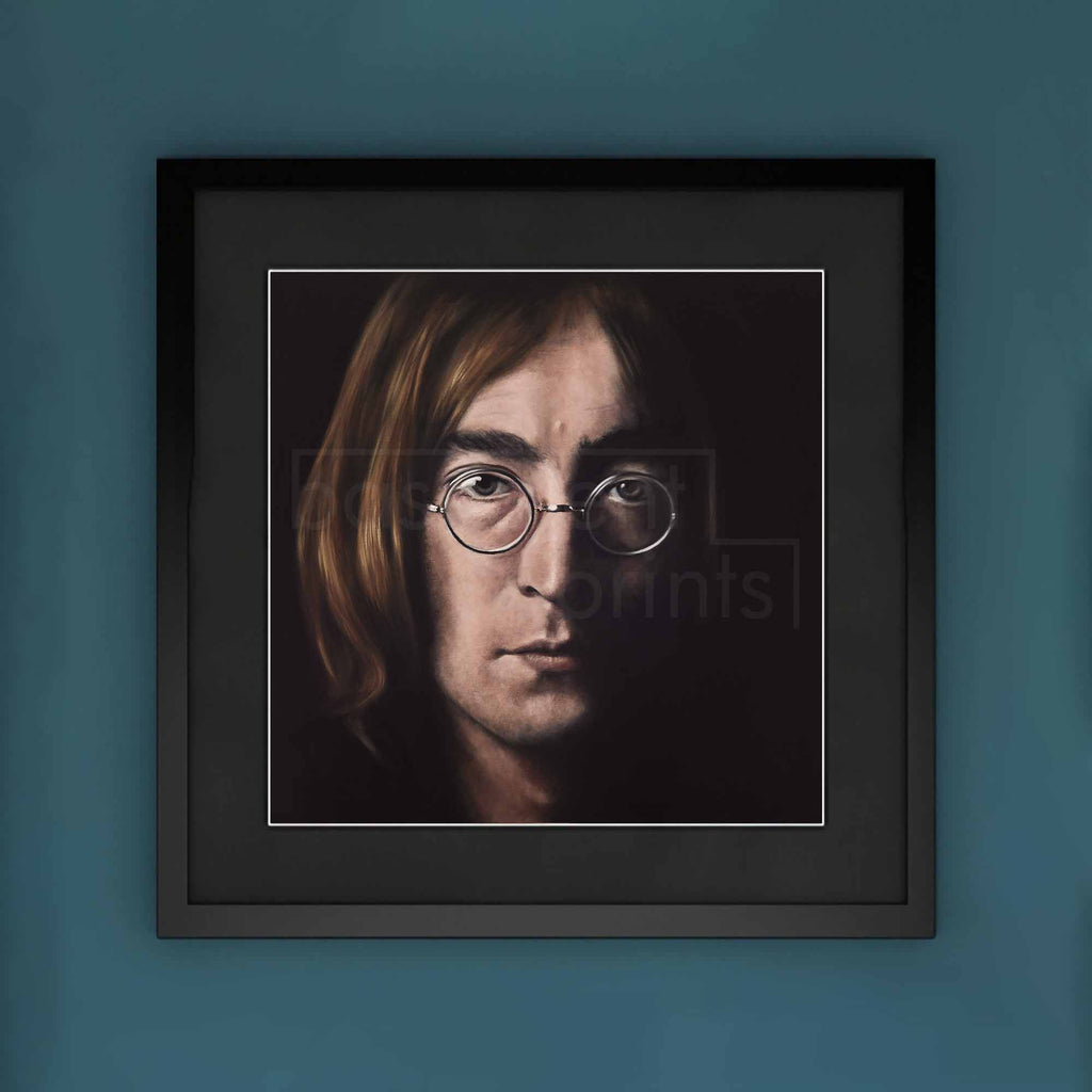 Framed portrait of John Lennon on a blue wall