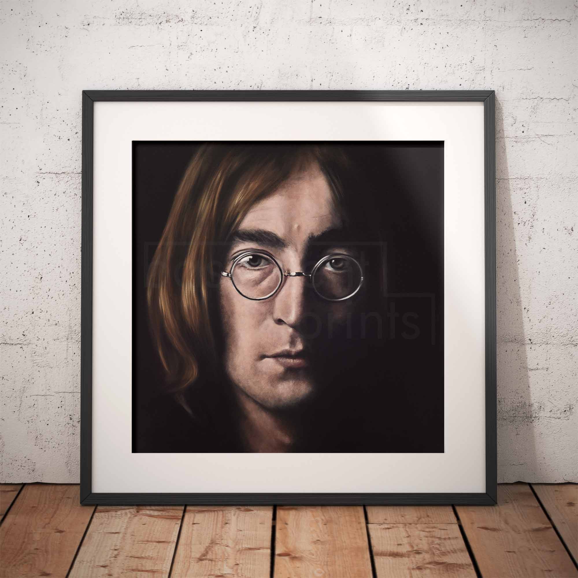 Framed portrait John Lennon on a wooden floor and white brick wall background