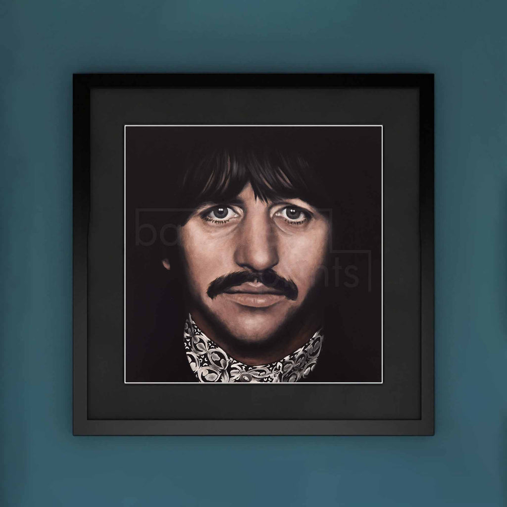 Framed portrait of Ringo Starr on a blue wall