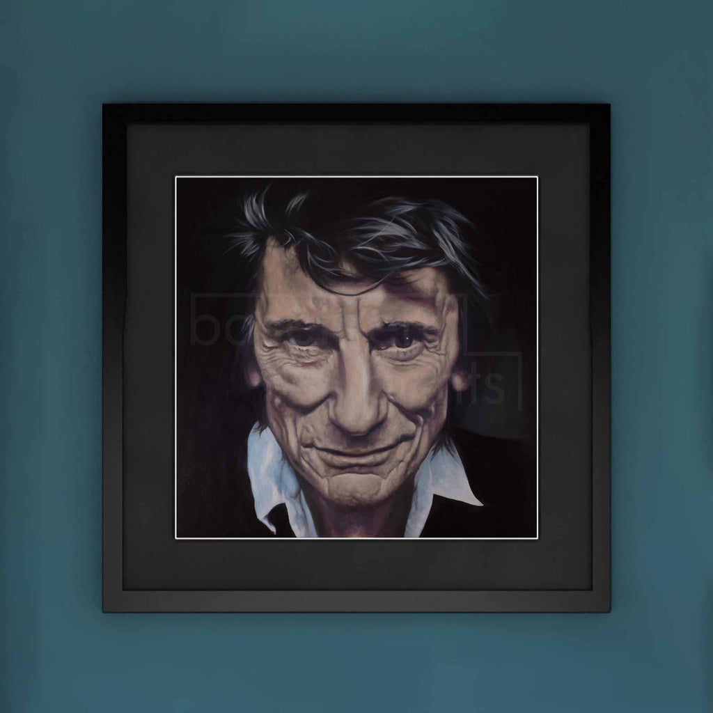 Framed portrait of Ronnie Wood on a blue wall