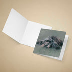 Open greeting card with a cockapoo dog painting on a beige background