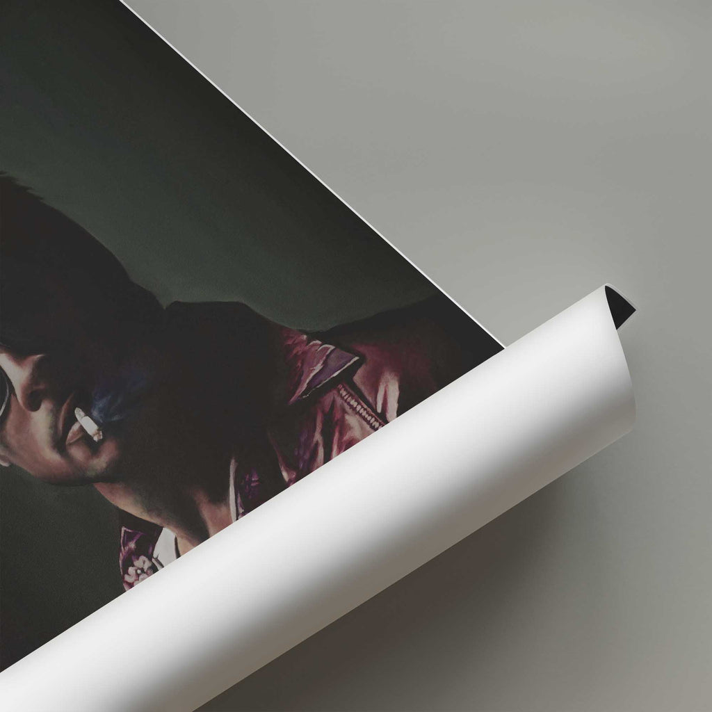 Roll of paper with a person wearing sunglasses and a leather jacket on a gray background