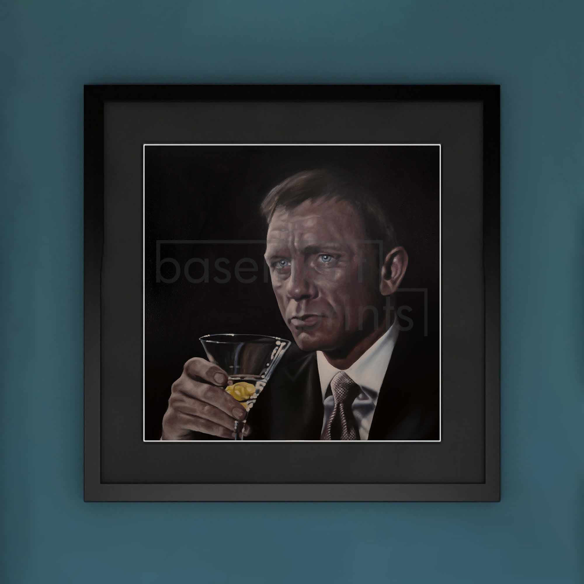Framed artwork of a James Bond, Daniel Craig holding a cocktail glass on a blue background