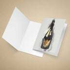 Greeting card of a Dom Perignon Champagne bottle on a beige background.
