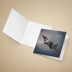 Greeting card with an F22 Raptor fighter jet on a stormy sky design, placed inside an open on a beige background.