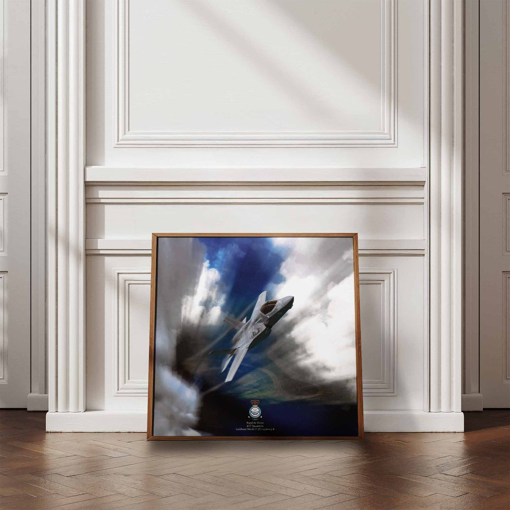 Framed artwork of an F-35 Lighting II aircraft on a wall in a room with wooden flooring.