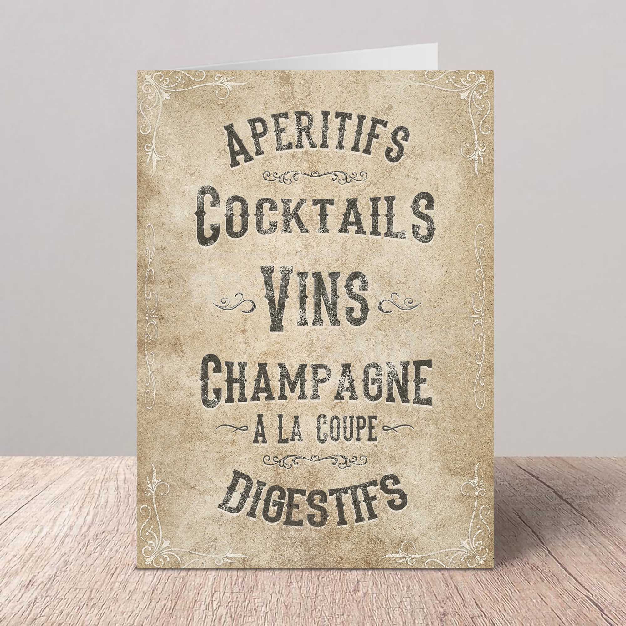 Vintage-style card with French text on a wooden surface