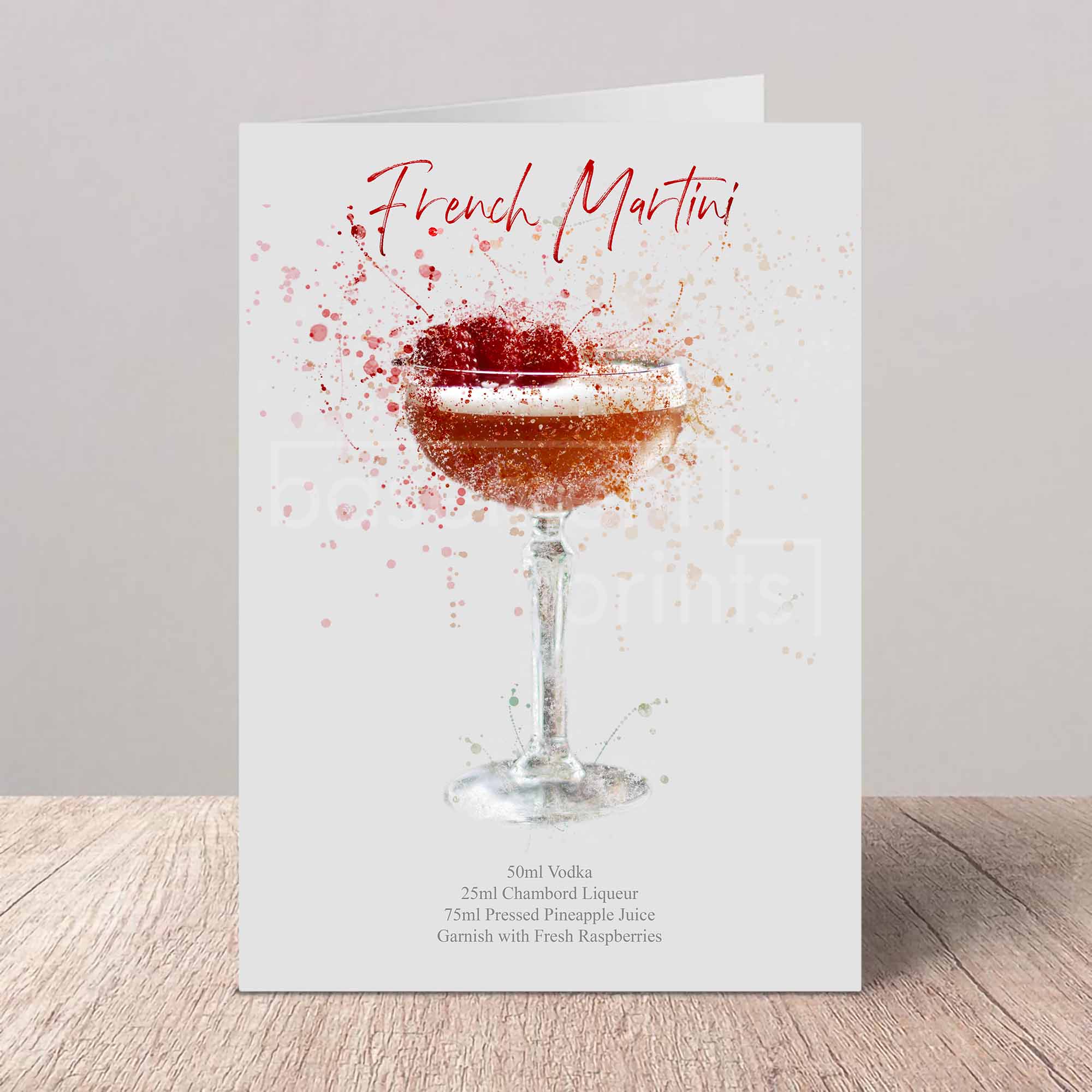 Card with a French Martini illustration and recipe on a wooden surface.