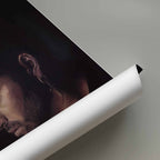 Roll of white paper with a portrait of George Michael on a gray background