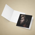 Greeting card with a portrait of George Michael on a beige background