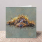 Greeting card with a golden cockapoo dog illustration on a white background