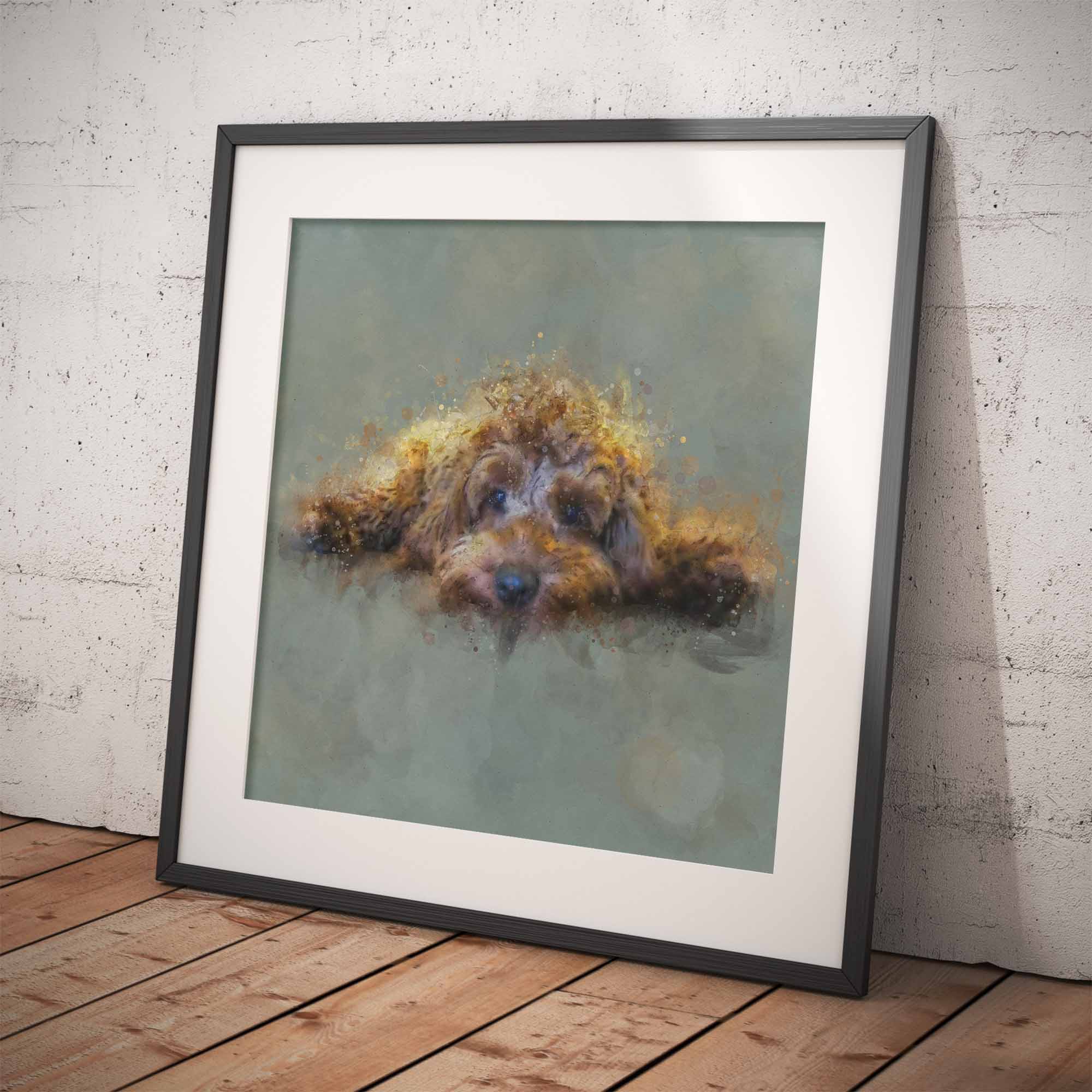 Framed artwork of a golden cockapoo dog, leaning against a textured white wall.