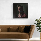 Framed portrait above a brown sofa with decorative pillows in a living room setting.