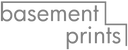 Logo of 'basement prints' in gray on a white background