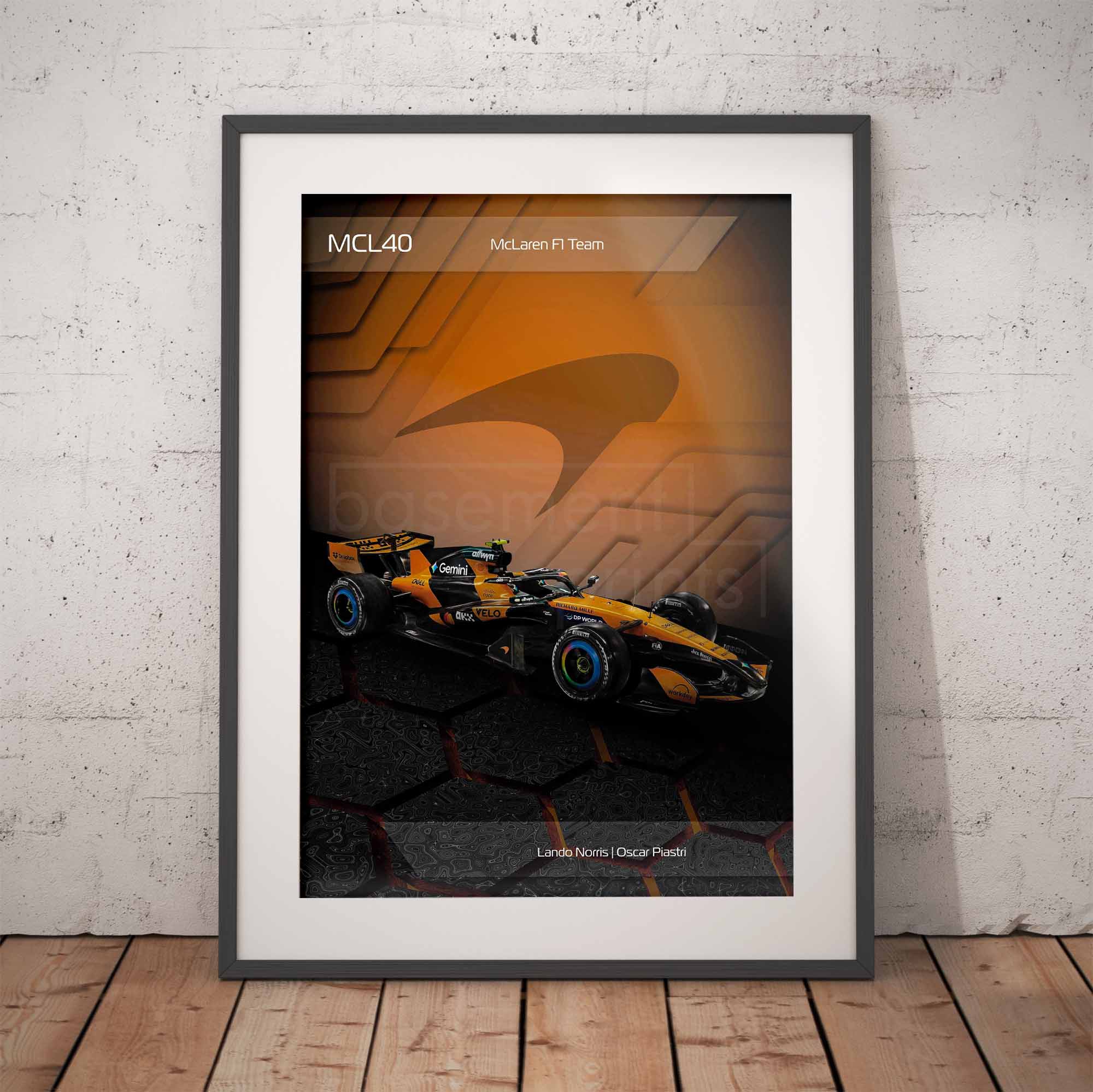 Framed poster of the McLaren MCL40 2026 Formula 1 car on a brick wall background